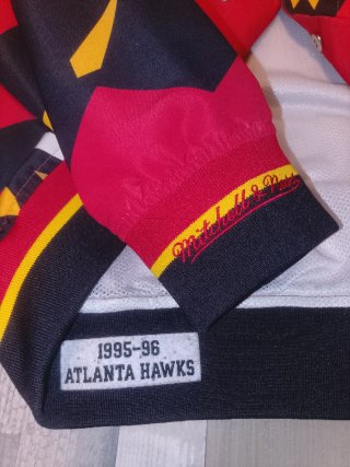 Chaqueta Hawks Mitchell & Ness