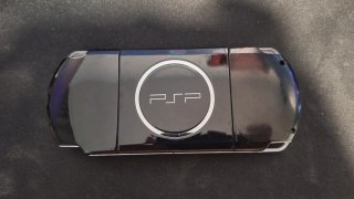 PSP 3004 Negra con lector roto + Tarjeta 64GB