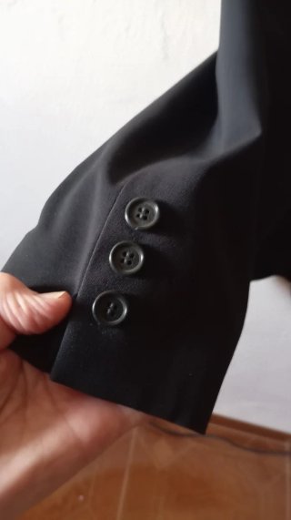 Traje de chaqueta y pantalón negro