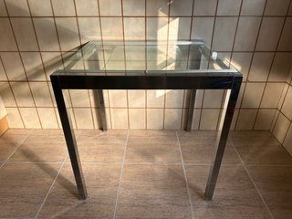 Mesa de cristal extensible