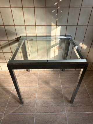Mesa de cristal extensible