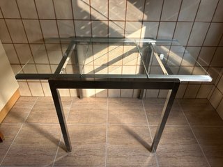 Mesa de cristal extensible