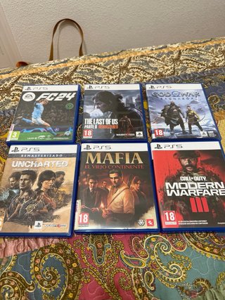 Playstation 5 con 2 mandos y 6 juegos