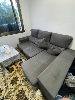 Sofá cama gris de tela