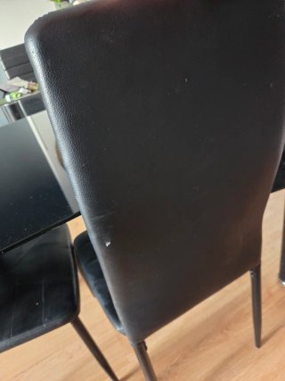 Mesa de cristal negra con 4 sillas