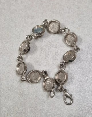 Pulsera con piedras marrones plateada
