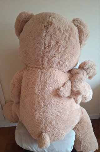 Oso de peluche gigante con bebé