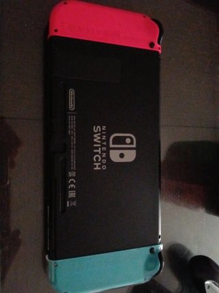 Nintendo Switch+ Mandos rosa/verde+ Complementos