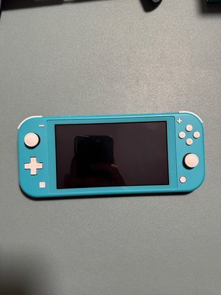 Nintendo Switch Lite + SD + 4 Juegos