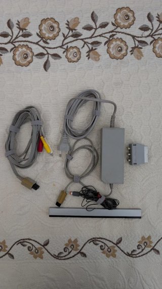 Nintendo Wii con 2 mandos y 4 juegos