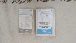 Nintendo Wii con 2 mandos y 4 juegos