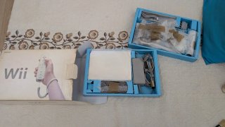 Nintendo Wii con 2 mandos y 4 juegos