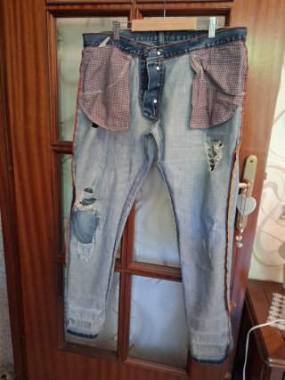 Pantaloni uomo strappati