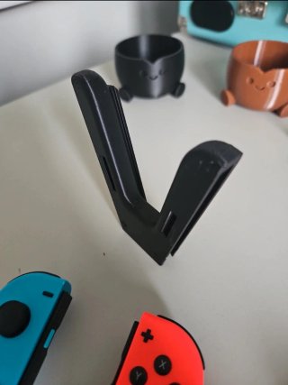 Porta Joycon con Slider per Nintendo Switch