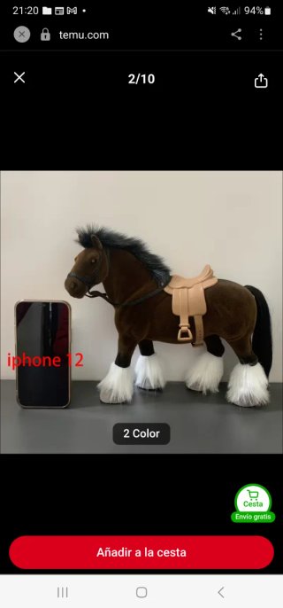 Caballo de peluche marrón con silla