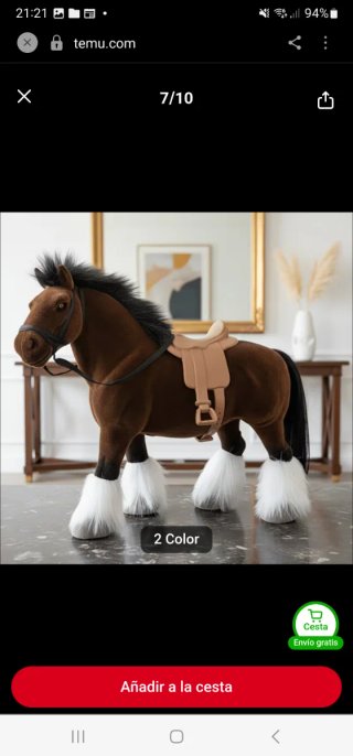 Caballo de peluche marrón con silla