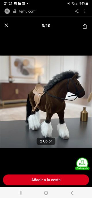 Caballo de peluche marrón con silla