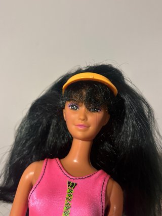 Muñeca Barbie con traje de baño