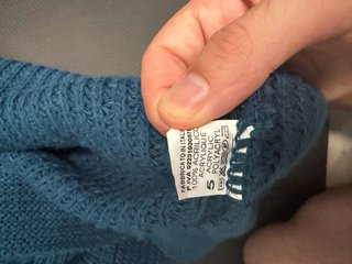Jersey azul cuello alto tejido