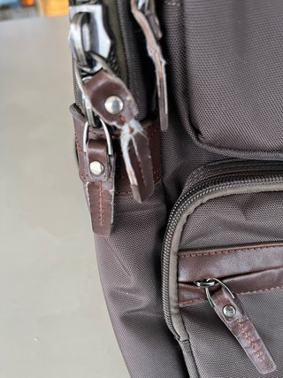 Mochila multi bolsillo con cremallera