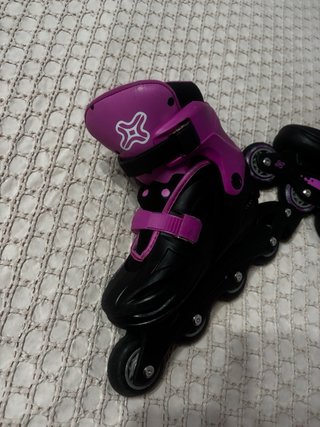 Patines en línea rosas y negros