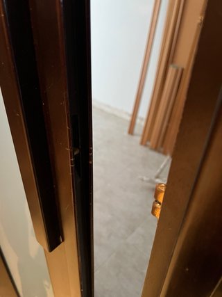 Puerta plegable madera y cristal