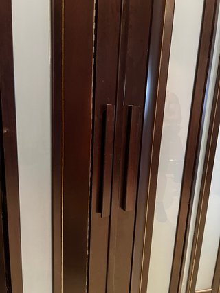 Puerta plegable madera y cristal