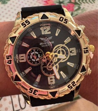 Reloj Dorado y Negro Correa Silicona cristal cuarz