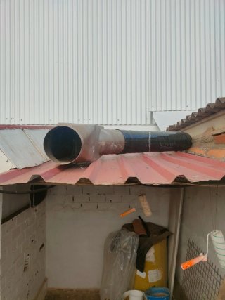 Chimenea de hierro con horno