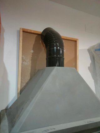 Chimenea de hierro con horno