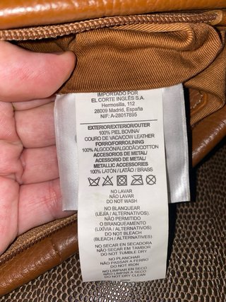 Bolso de piel con pedrería