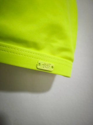 Top bikini verde/amarillo con corte
