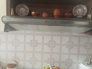 Muebles de cocina beige y blanco