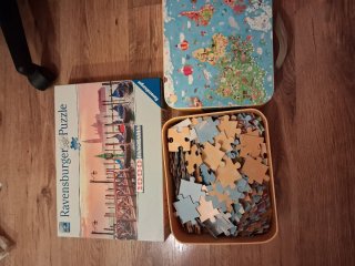 2 Puzzles Ravensburger y Mapa Mundo