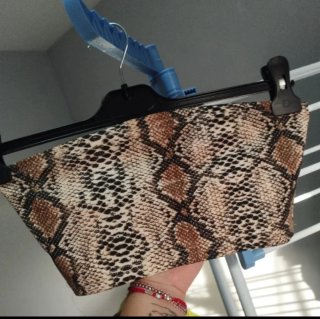 Conjunto falda negra y Top Animal Print