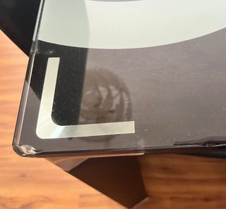Mesa de cristal negra con diseño