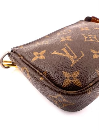 Mini Pochette Louis Vuitton Marrón