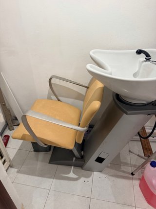 Lavabo de peluquería con silla