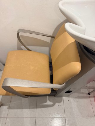 Lavabo de peluquería con silla