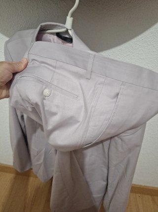 Traje de hombre rosa nuevo