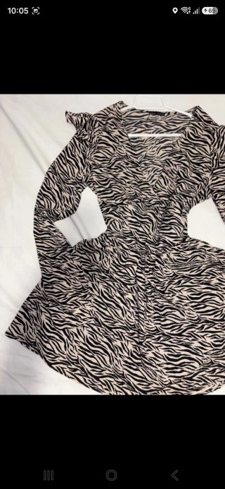 Vestido Bershka estampado cebra talla M