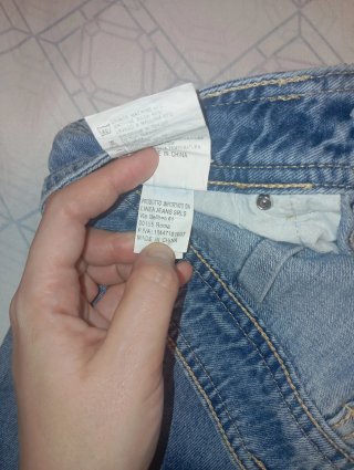 Pantalón vaquero ancho con flecos