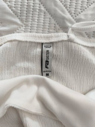 Mono blanco mujer