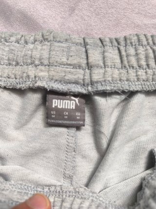 Pantalones cortos Puma grises y blancos