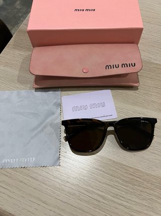 Gafas de sol Miu Miu Tortoise/Oro