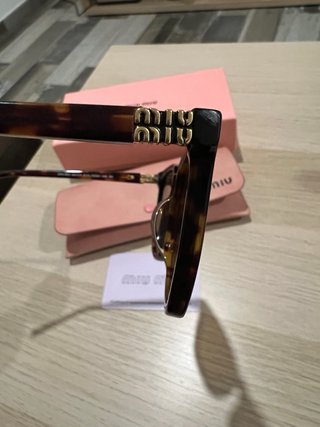 Gafas de sol Miu Miu Tortoise/Oro