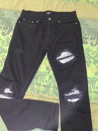 Pantalones vaqueros negros rotos MAN