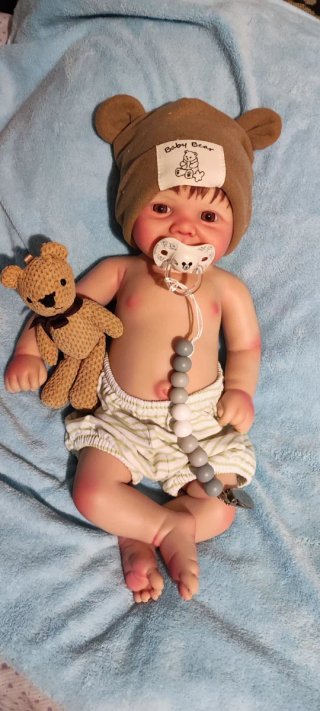 Tierno reborn silicona niño  con pelo caoba