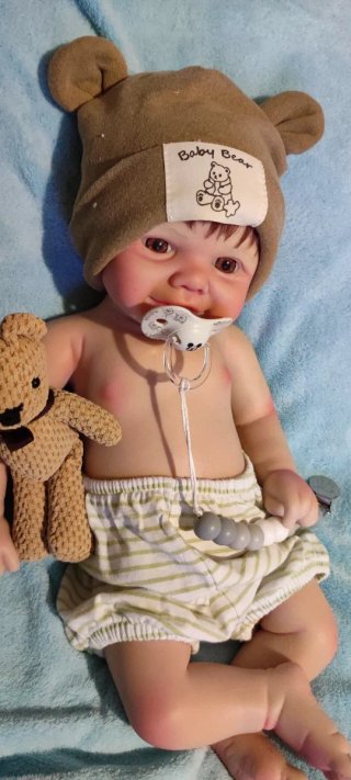 Tierno reborn silicona niño  con pelo caoba