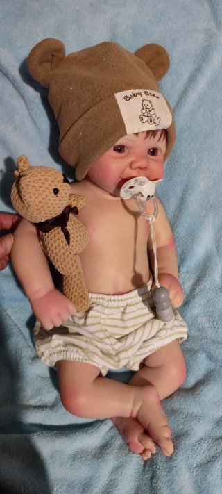 Tierno reborn silicona niño  con pelo caoba